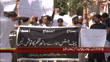 Pehawar- Local Traders Protest against Police